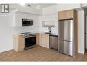 604 Cawston Avenue Unit# 615, Kelowna, BC  - Indoor Photo Showing Kitchen With Stainless Steel Kitchen 