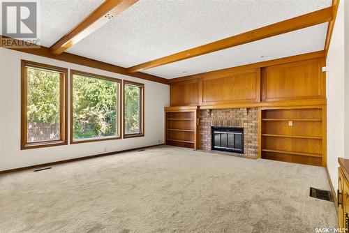 2610 Thornicroft Bay E, Regina, SK - Indoor With Fireplace