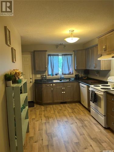 10 71 Cameron Way, Yorkton, SK - Indoor Photo Showing Kitchen With Double Sink