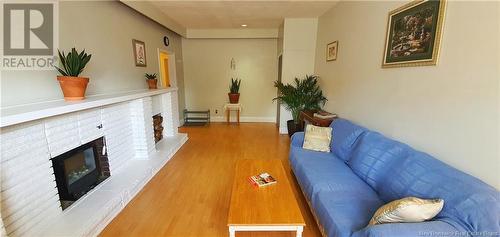 113-115-117 Alma Street, Moncton, NB - Indoor Photo Showing Living Room With Fireplace