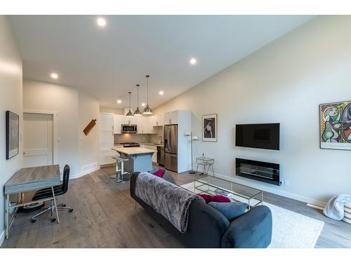 12 - 1512 Granite Drive, Golden, BC - Indoor Photo Showing Living Room With Fireplace