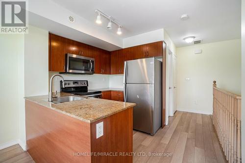 317 - 1070 Progress Avenue, Toronto (Malvern), ON - Indoor Photo Showing Kitchen With Double Sink