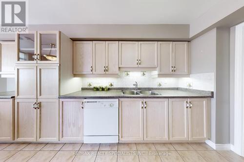 1705 - 35 Kingsbridge Garden Circle, Mississauga (Hurontario), ON - Indoor Photo Showing Kitchen With Double Sink