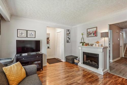 5938 Frontenac Street, Niagara Falls, ON - Indoor Photo Showing Living Room With Fireplace