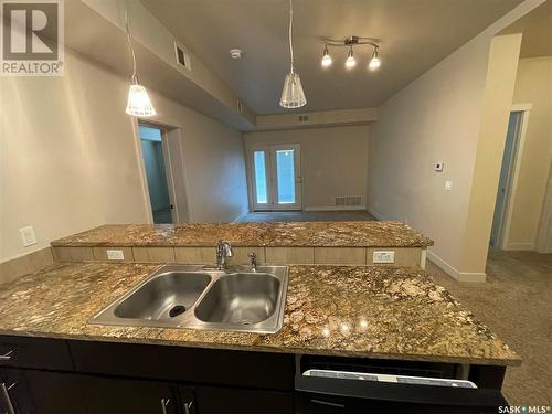 105 71 Riverwood Drive, Weyburn, SK - Indoor Photo Showing Kitchen With Double Sink