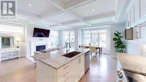 12 Chimney Swift Court, Toronto (Princess-Rosethorn), ON - Indoor Photo Showing Kitchen With Fireplace