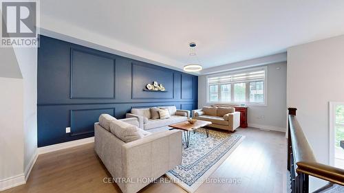 12 Chimney Swift Court, Toronto (Princess-Rosethorn), ON - Indoor Photo Showing Living Room With Fireplace