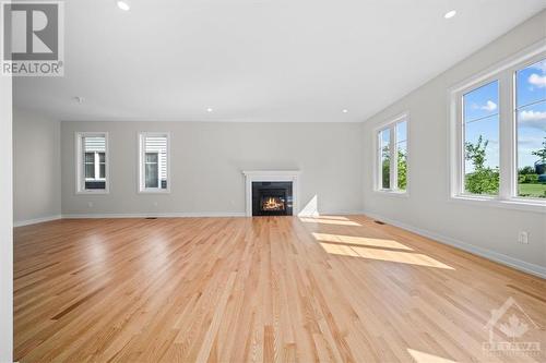 Great Room - 91 Hackamore Crescent, Richmond, ON - Indoor Photo Showing Living Room With Fireplace