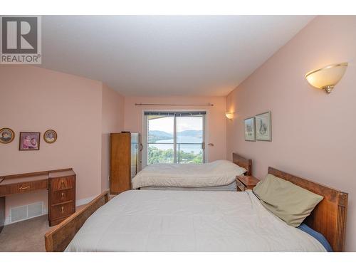 8816 Michael Drive, Coldstream, BC - Indoor Photo Showing Bedroom