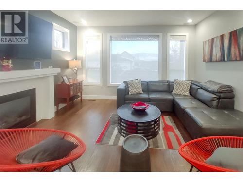 1745 K.L.O. Road, Kelowna, BC - Indoor Photo Showing Living Room With Fireplace