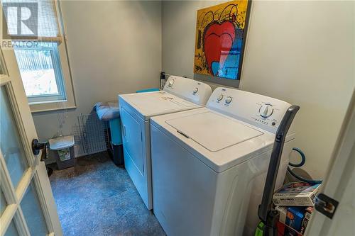 Main floor laundry room with attached powder room - 343 Irving Street, Pembroke, ON - Indoor Photo Showing Laundry Room