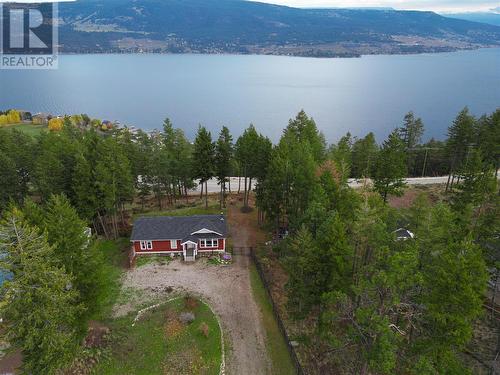 7265 Dunwaters Drive, Kelowna, BC - Outdoor With Body Of Water With View