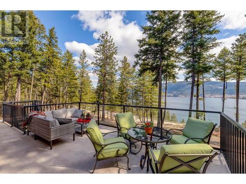 7265 Dunwaters Drive, Kelowna, BC - Outdoor With Body Of Water With Deck Patio Veranda With View With Exterior