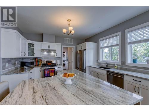 7265 Dunwaters Drive, Kelowna, BC - Indoor Photo Showing Kitchen With Double Sink