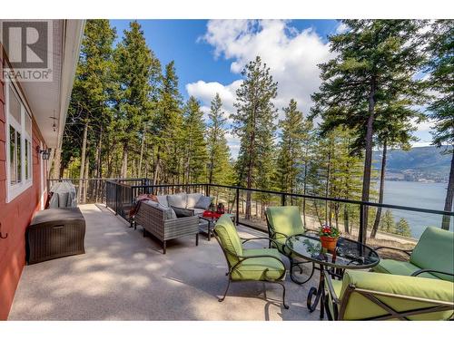 7265 Dunwaters Drive, Kelowna, BC - Outdoor With Body Of Water With Deck Patio Veranda With View With Exterior