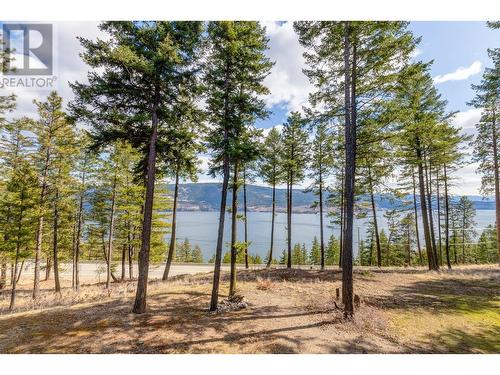 7265 Dunwaters Drive, Kelowna, BC - Outdoor With Body Of Water With View