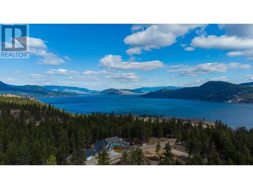 7265 Dunwaters Drive, Kelowna, BC - Outdoor With Body Of Water With View