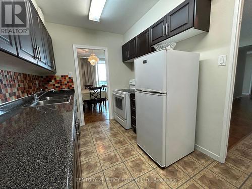 902 - 44 Longbourne Drive, Toronto (Willowridge-Martingrove-Richview), ON - Indoor Photo Showing Kitchen With Double Sink