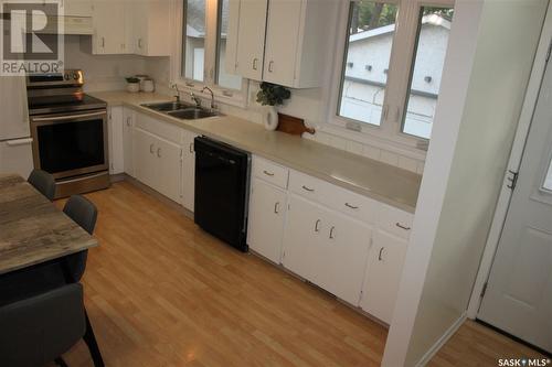 6 Rutley Street, Regina, SK - Indoor Photo Showing Kitchen With Double Sink