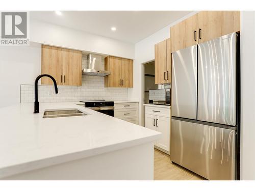 10 Wilson Street, Kitimat, BC - Indoor Photo Showing Kitchen With Double Sink With Upgraded Kitchen