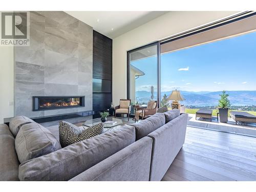 265 Peregrine Place, Osoyoos, BC - Indoor Photo Showing Living Room With Fireplace