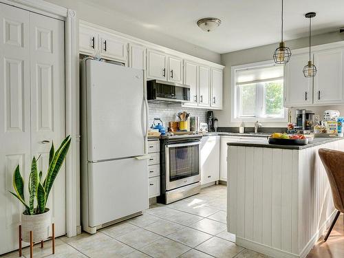 Cuisine - 383  - 383A Boul. Ste-Rose, Laval (Sainte-Rose), QC - Indoor Photo Showing Kitchen