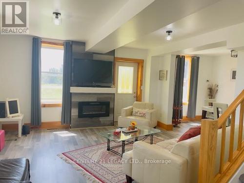 026735 Highway 89 Road, Southgate, ON - Indoor Photo Showing Living Room With Fireplace