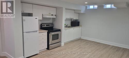 Basment - 24 Thurso Close, Vaughan, ON - Indoor Photo Showing Kitchen With Double Sink