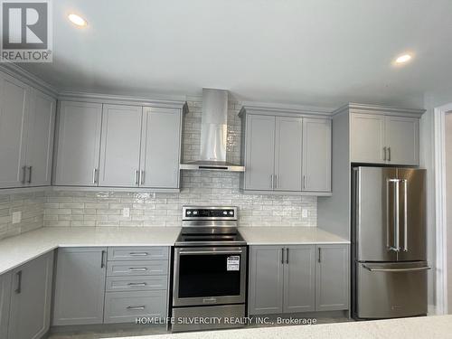 82 Bearberry Road, Springwater (Minesing), ON - Indoor Photo Showing Kitchen With Upgraded Kitchen