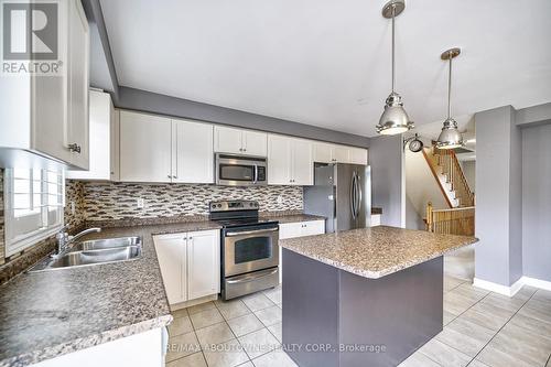 25 - 2006 Trawden Way, Oakville (Palermo West), ON - Indoor Photo Showing Kitchen With Double Sink With Upgraded Kitchen