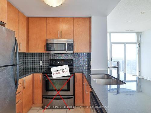 Ph106-5791 Yonge St, Toronto, ON - Indoor Photo Showing Kitchen With Double Sink