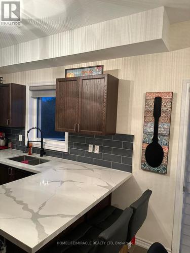 13 Todd Crescent N, Southgate, ON - Indoor Photo Showing Kitchen With Double Sink