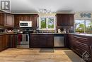 4666 Matawatchan Road, Greater Madawaska, ON  - Indoor Photo Showing Kitchen With Double Sink 