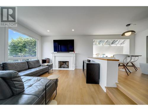 1987 W 35 Avenue, Vancouver, BC - Indoor Photo Showing Living Room With Fireplace