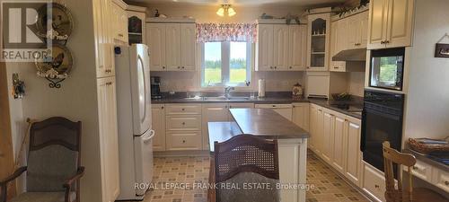 260 Plourde Road, Fauquier-Strickland, ON - Indoor Photo Showing Kitchen With Double Sink