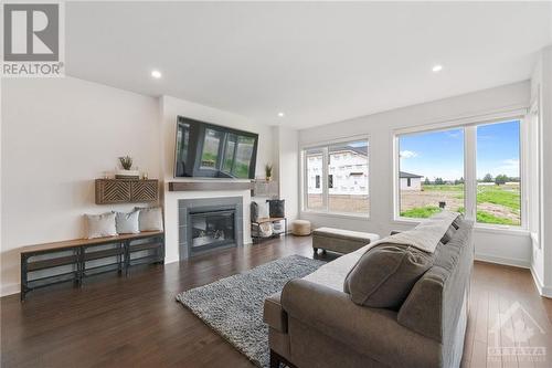 504 Ascender Avenue, Ottawa, ON - Indoor Photo Showing Living Room With Fireplace