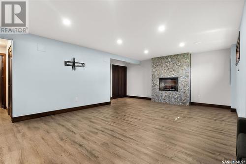 22 4640 Harbour Landing Drive, Regina, SK - Indoor With Fireplace