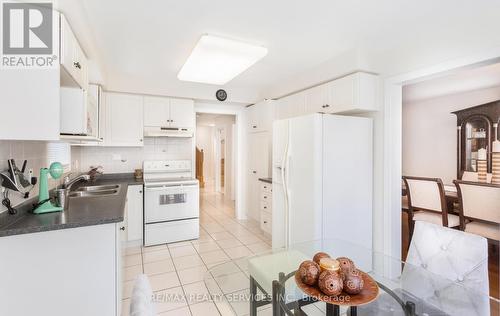 52 Sunny Glen Crescent, Brampton (Northwest Sandalwood Parkway), ON - Indoor Photo Showing Kitchen With Double Sink