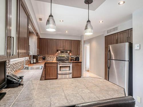 Kitchen - 273 Rue Harvey, Repentigny (Le Gardeur), QC - Indoor Photo Showing Kitchen With Upgraded Kitchen