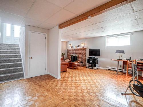 Salle familiale - 273 Rue Harvey, Repentigny (Le Gardeur), QC - Indoor Photo Showing Basement