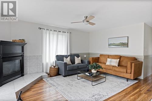 166 Stirling Street, Lakeshore, ON - Indoor Photo Showing Living Room With Fireplace