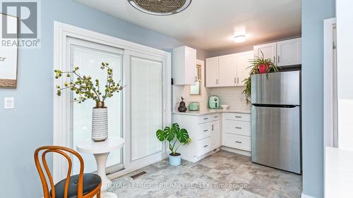 Quartz counters and a nice backsplash - 154 - 700 Osgoode Drive, London, ON - Indoor Photo Showing Kitchen