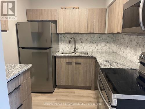 307 - 15 Jacksway Crescent, London, ON - Indoor Photo Showing Kitchen With Double Sink