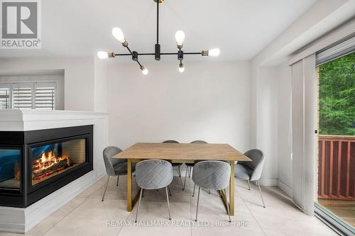 11 Alberta Drive, Vaughan, ON - Indoor Photo Showing Dining Room With Fireplace