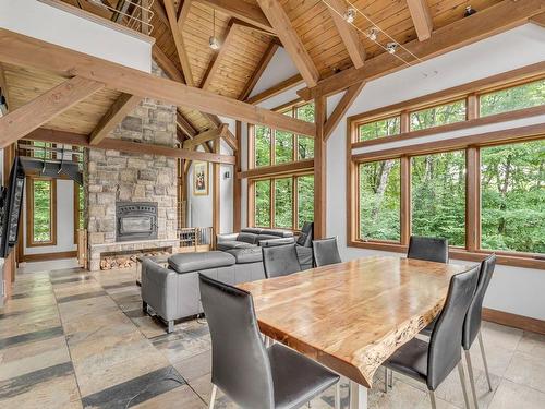 Vue d'ensemble - 35 Ch. Du Geai-Bleu, Stoneham-Et-Tewkesbury, QC - Indoor Photo Showing Dining Room With Fireplace