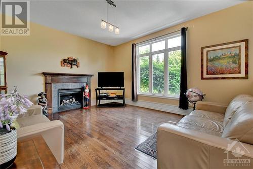 135 Riversedge Crescent, Ottawa, ON - Indoor Photo Showing Living Room With Fireplace