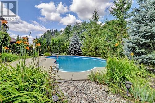 135 Riversedge Crescent, Ottawa, ON - Outdoor With In Ground Pool