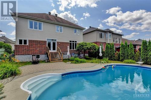 135 Riversedge Crescent, Ottawa, ON - Outdoor With In Ground Pool