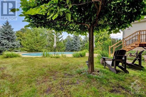 135 Riversedge Crescent, Ottawa, ON - Outdoor With In Ground Pool