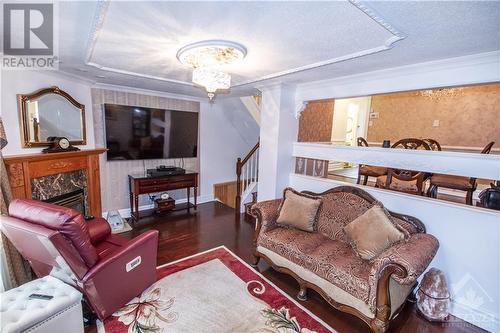 16 Larkshire Lane Unit#B, Ottawa, ON - Indoor Photo Showing Living Room With Fireplace